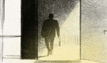 a man carrying a small bag walking into a well lit office 