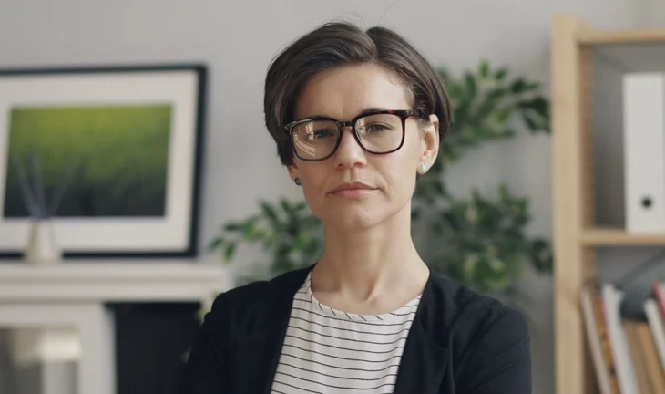 a woman looking at the camera