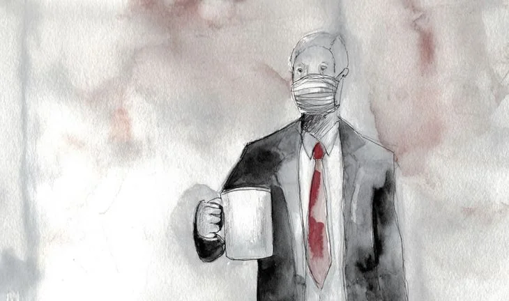 a man in a suit holding a cup 