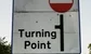 A sign that says turning point 