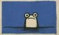 a frog surfacing in some water 